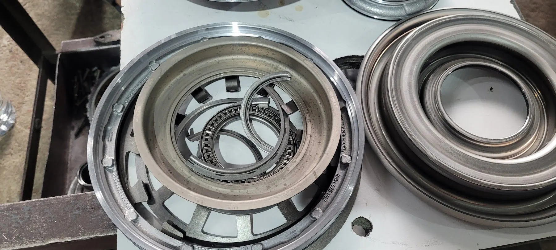 Piston and seal housings from an automatic gearbox
